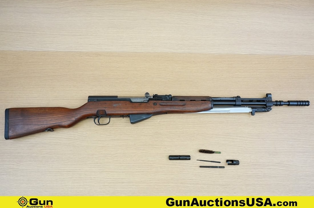 YUGO SKS 7.62X39 COLLECTOR'S Rifle. Excellent. 22" Barrel. Shiny Bore, Tight Action Semi Auto .: YUGO SKS 7.62X39 COLLECTOR'S Rifle. Excellent. 22" Barrel. Shiny Bore, Tight Action Semi Auto . Features MATCHING NUMBERS on Stock, Receiver and Bolt with a Dove Tail Front Sight, Very Nice Wood Grain