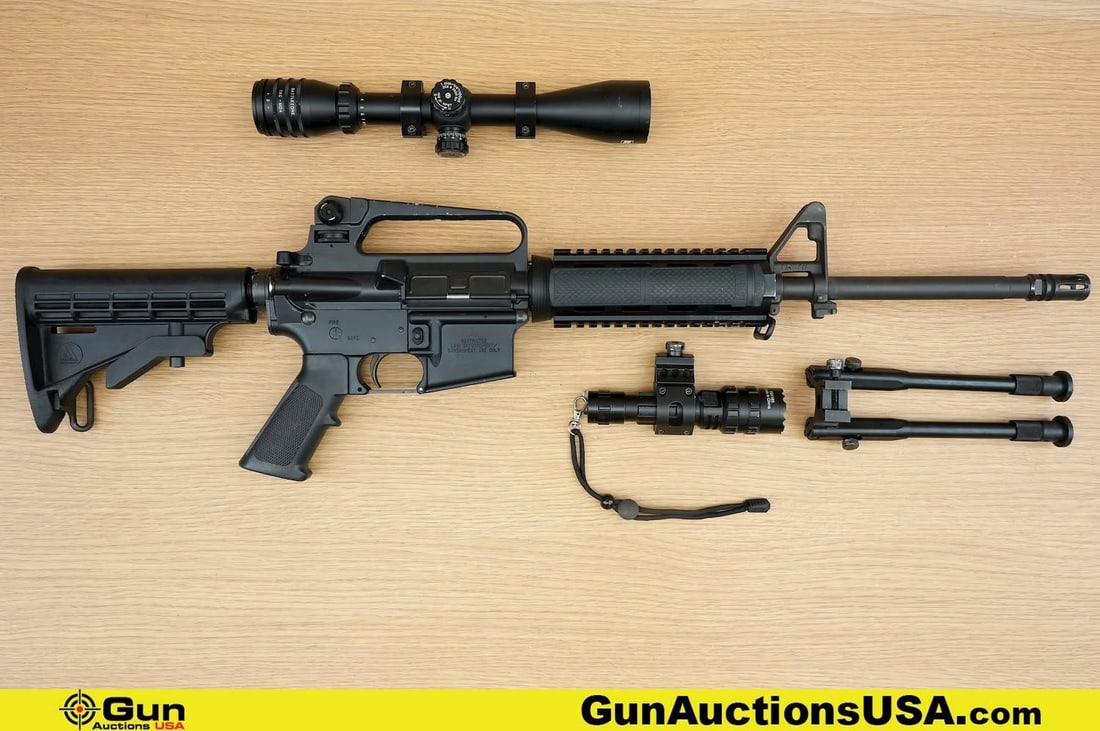Bushmaster XM-15 .223-5.56MM THREADED BARREL Rifle. Good Condition, Normal Handling Marks. 16": Bushmaster XM-15 .223-5.56MM THREADED BARREL Rifle. Good Condition, Normal Handling Marks. 16" Barrel. Shiny Bore, Tight Action Semi Auto Features A THREADED CARBINE H-Bar PROFILE BARREL with A2 Flash