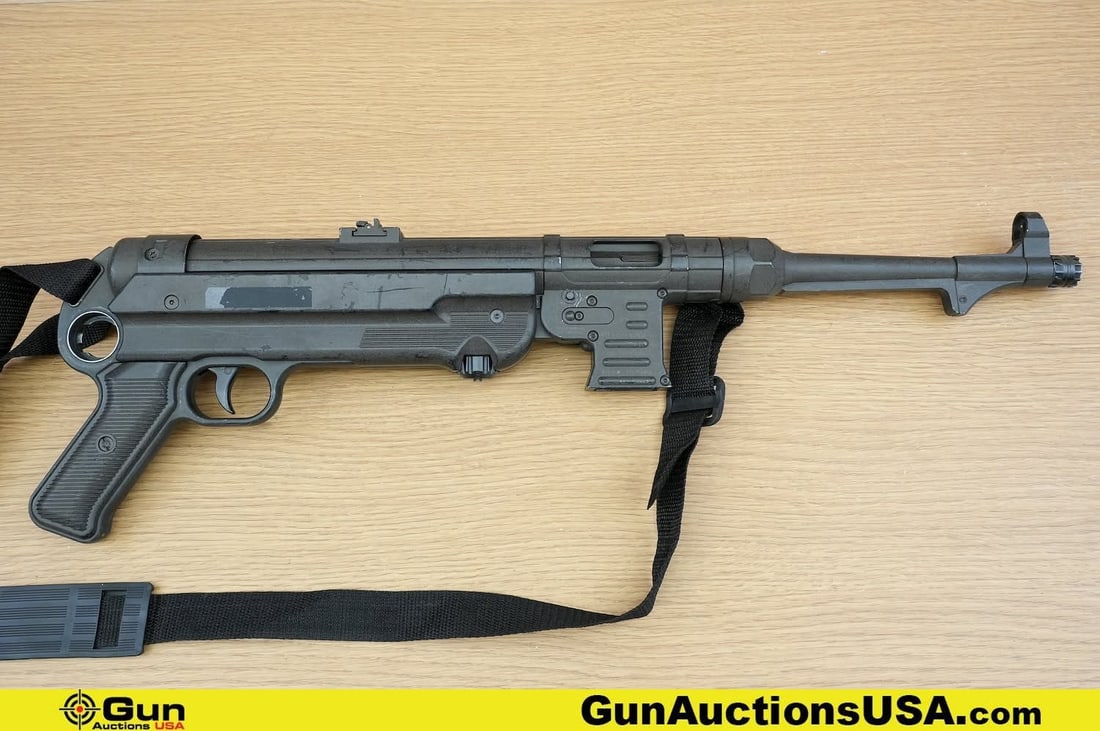 ATI GSG MP40P 9mm Pistol. Needs Repair. 9.5" Barrel. Shiny Bore, Tight Action Semi Auto Features a: ATI GSG MP40P 9mm Pistol. Needs Repair. 9.5" Barrel. Shiny Bore, Tight Action Semi Auto Features a Dual Blade Rear Sight, Polymer Hand Grip and Hand Guards, Ghost Ring Front Sight, Pistol Grip with a