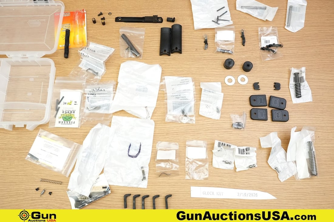 Glock Gun Parts . Very Good. . Assorted Glock Parts. Includes Plastic Container. . (82778) (GSCM53) (1 of 20)