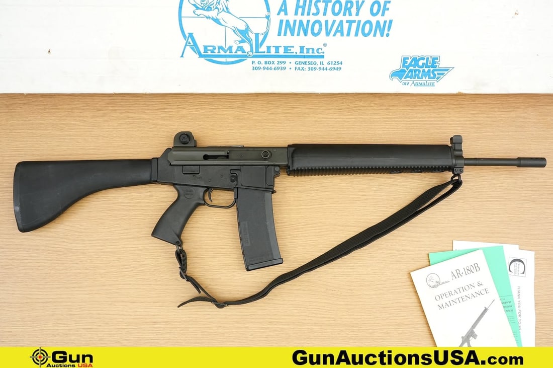 ARMALITE AR-180B 5.56 MM Rifle. Excellent. 19.5" Barrel. Shiny Bore, Tight Action Semi Auto.: ARMALITE AR-180B 5.56 MM Rifle. Excellent. 19.5" Barrel. Shiny Bore, Tight Action Semi Auto. Features a Lightweight Polymer Lower Receiver, Matte Black Finish, Ported Barrel, Adjustable Front and Rear