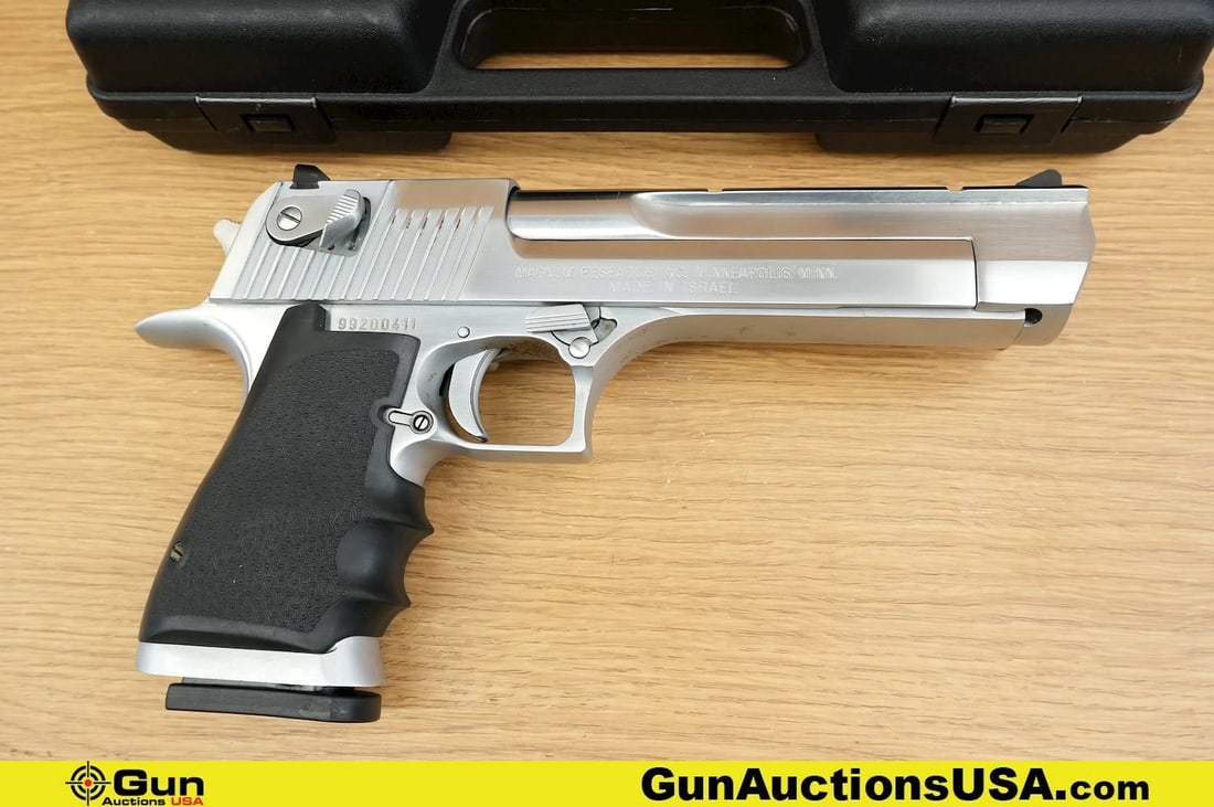 ISRAEL MILITARY DESERT EAGLE .50AE/.44 MAG Pistol. Good Condition, Normal Handling Marks. 6" Barrel.: ISRAEL MILITARY DESERT EAGLE .50AE/.44 MAG Pistol. Good Condition, Normal Handling Marks. 6" Barrel. Shiny Bore, Tight Action Semi Auto. Features Rear Slide Serrations, Ambi Safety, Left Side Slide Lo