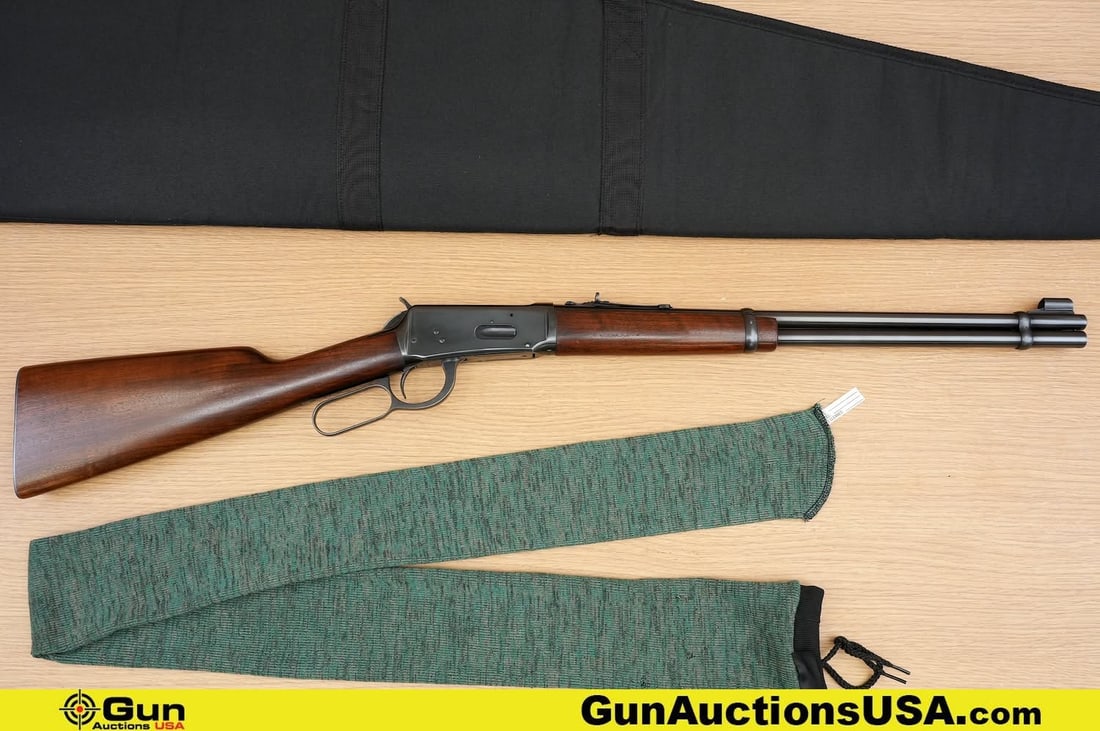 Winchester 94 30-30 WIN Rifle. Very Good. 20" Barrel. Shiny Bore, Tight Action Lever Action .: Winchester 94 30-30 WIN Rifle. Very Good. 20" Barrel. Shiny Bore, Tight Action Lever Action . Featuring a Beautiful Walnut Stock with Stunning Grains, Blued Receiver and Barrel, Front Dove tail Bead S