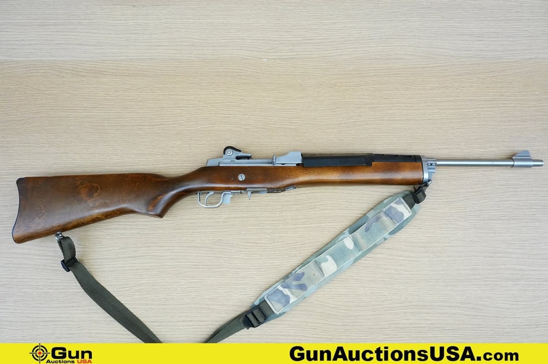 RUGER MINI-14 .223 cal. Rifle. Excellent. 18" Barrel. Shiny Bore, Tight Action Semi Auto . Very Nice: RUGER MINI-14 .223 cal. Rifle. Excellent. 18" Barrel. Shiny Bore, Tight Action Semi Auto . Very Nice and Light Weight, Featuring a Full Length Walnut Stock, Fully Adjustable After Market Flip Up Rear 