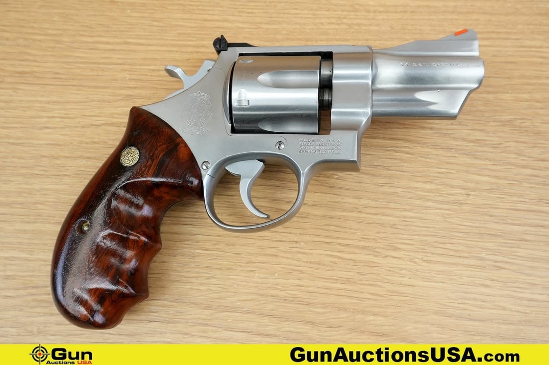 S&W 624 .44 S&W SPECIAL Revolver. Excellent. 3" Barrel. Shiny Bore, Tight Action . STUNNING!: S&W 624 .44 S&W SPECIAL Revolver. Excellent. 3" Barrel. Shiny Bore, Tight Action . STUNNING! Features a Fluted Six Shot Cylinder, DA/SA, Robust Stainless Steel Frame, Ergonomic Wooden grips, with S&W 
