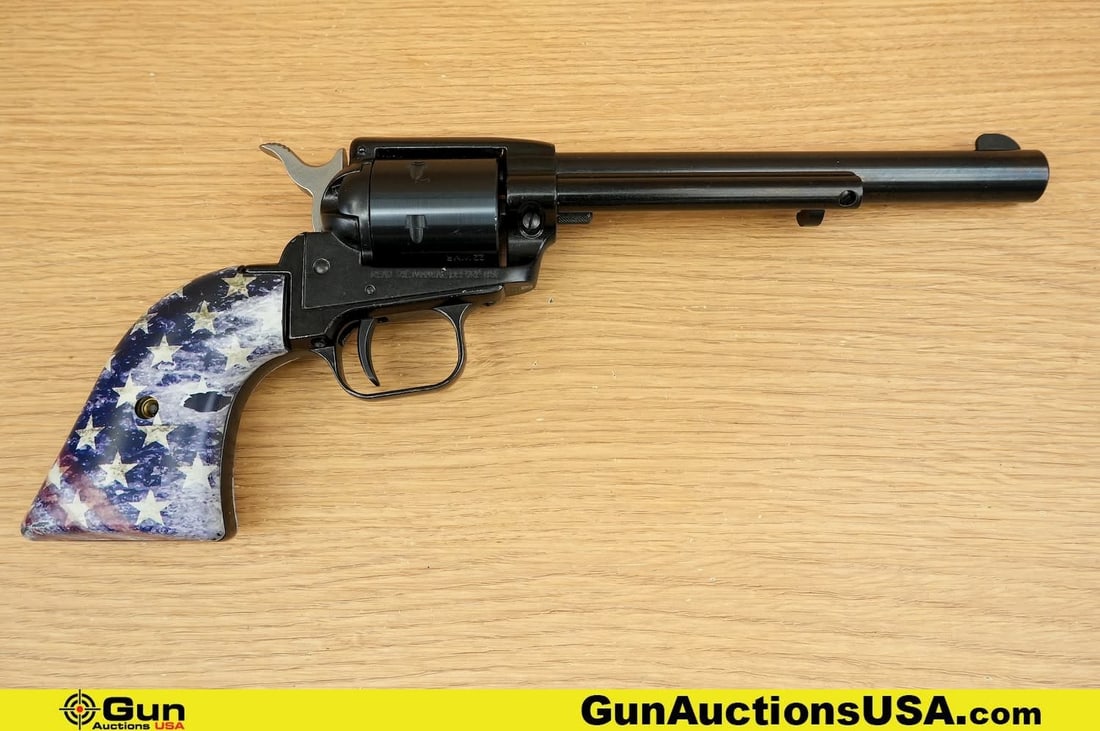 Heritage MFG ROUGH RIDER .22 WMR Revolver. Very Good. 6" Barrel. Shiny Bore, Tight Action . Features: Heritage MFG ROUGH RIDER .22 WMR Revolver. Very Good. 6" Barrel. Shiny Bore, Tight Action . Features a Striking Blend of Old-West Styling, Precision-Machined Barrel, with a Seven Shot Cylinder. Left S