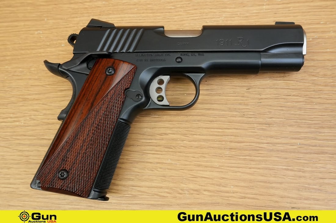REMINGTON 1911 R1 .45 AUTO RARE AND COLLECTIBLE Pistol. Excellent. 4.25" Barrel. Shiny Bore, Tight: REMINGTON 1911 R1 .45 AUTO RARE AND COLLECTIBLE Pistol. Excellent. 4.25" Barrel. Shiny Bore, Tight Action Semi Auto . STUNNING and Features a Hard Wood Checkered Grips, Checkered Extended Beavertail S