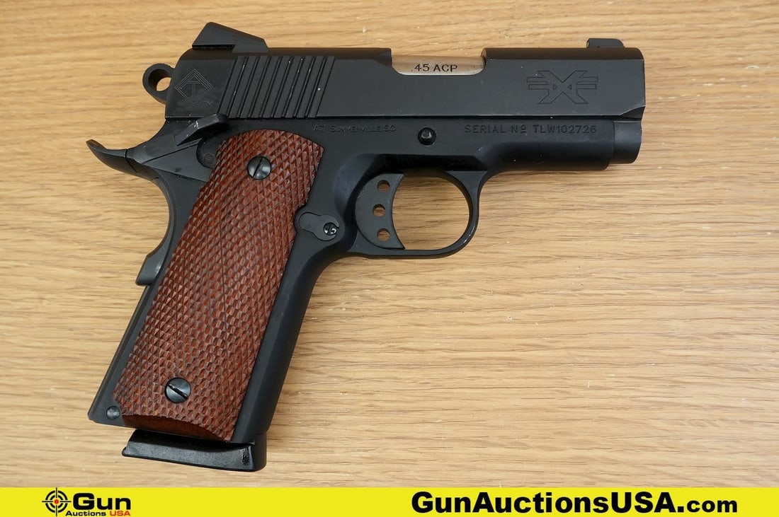 ATI S.A.M. TITAN-LW .45 ACP Pistol. Good Condition, Normal Handling Marks. 3" Barrel. Shiny Bore,: ATI S.A.M. TITAN-LW .45 ACP Pistol. Good Condition, Normal Handling Marks. 3" Barrel. Shiny Bore, Tight Action Semi Auto . Features Checkered Wood Grips, Rear Slide Serrations, Ambi Safety, Fixed Thre