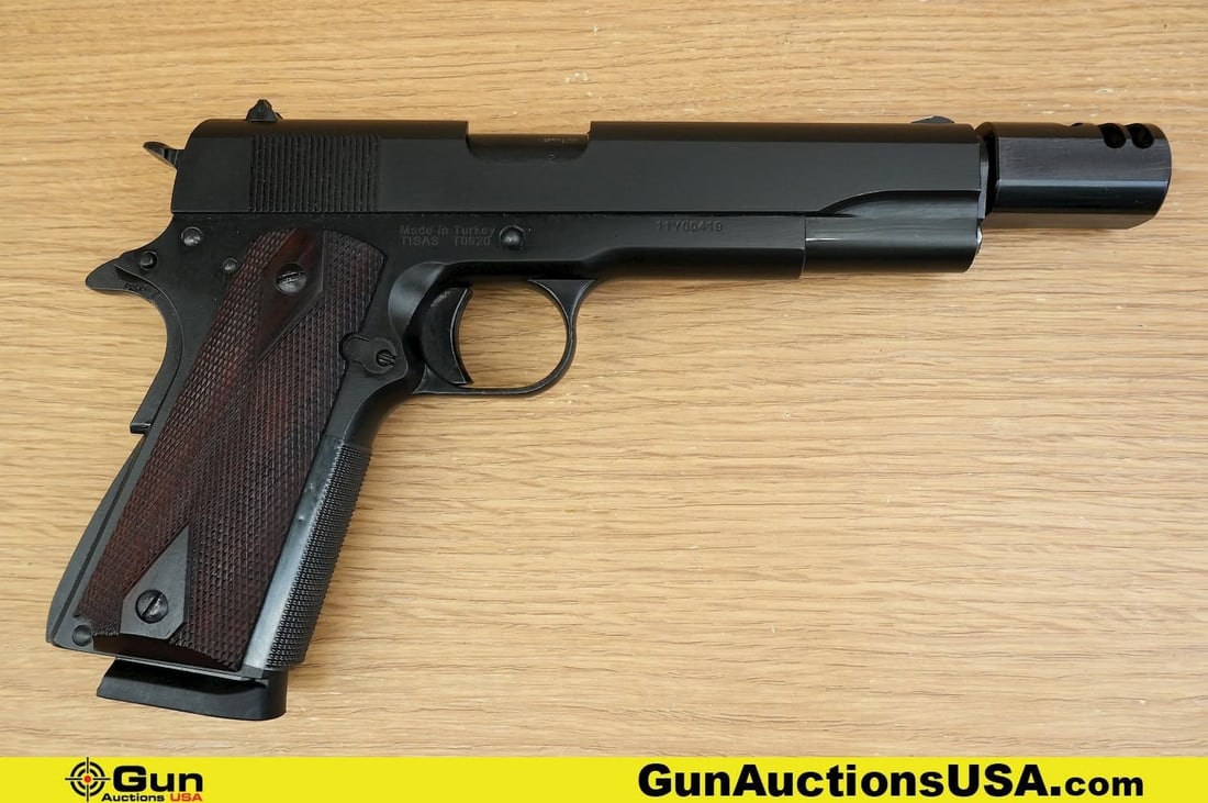 TISAS 1911A1 .45 ACP Pistol. Very Good. 5" Barrel. Shiny Bore, Tight Action Semi Auto . Featuring: TISAS 1911A1 .45 ACP Pistol. Very Good. 5" Barrel. Shiny Bore, Tight Action Semi Auto . Featuring Checkered Wood Grips, Forged Steel Checkered Frame, Rear Slide Serrations, A1 Hammer, Left Side Thumb 