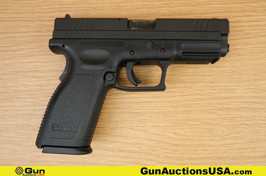 SPRINGFIELD XD-40 .40 S&W Pistol. Very Good. 3.75" Barrel. Shiny Bore, Tight Action Semi Auto .: SPRINGFIELD XD-40 .40 S&W Pistol. Very Good. 3.75" Barrel. Shiny Bore, Tight Action Semi Auto . Features a Textured Polymer Frame, Front Accessory Rail, Ergonomic grip, High-visibility sights, and Inc