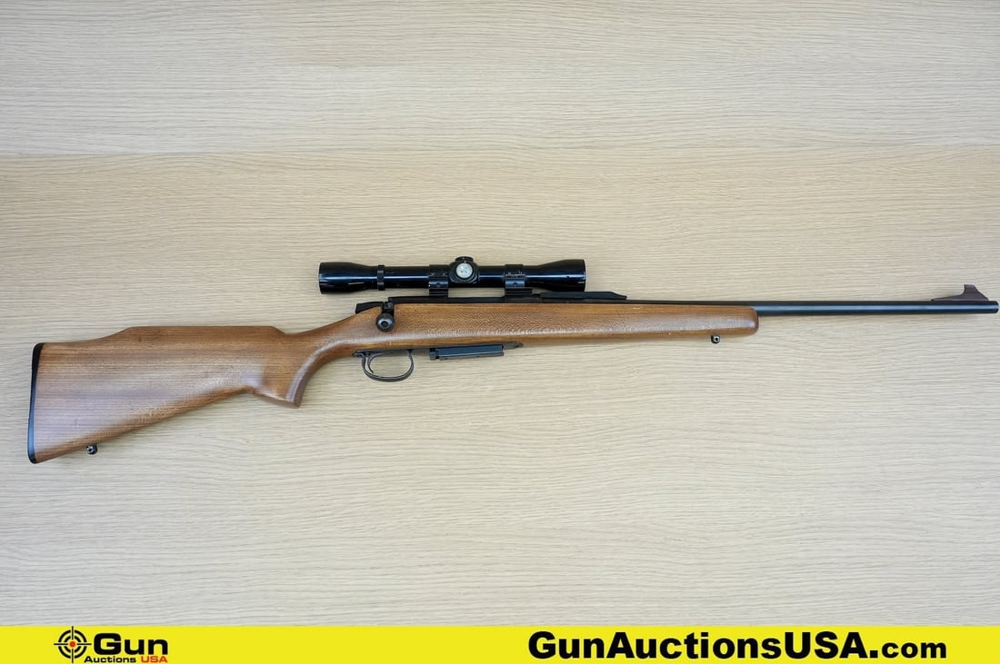 REMINGTON 788 30-30 WIN Rifle. Very Good. 21.75" Barrel. Shiny Bore, Tight Action Bolt Action .: REMINGTON 788 30-30 WIN Rifle. Very Good. 21.75" Barrel. Shiny Bore, Tight Action Bolt Action . Features a Robust Nicely Blued Barrel and Receiver, Hardwood Stock, Ramp Front Sight, Missing Rear Sight