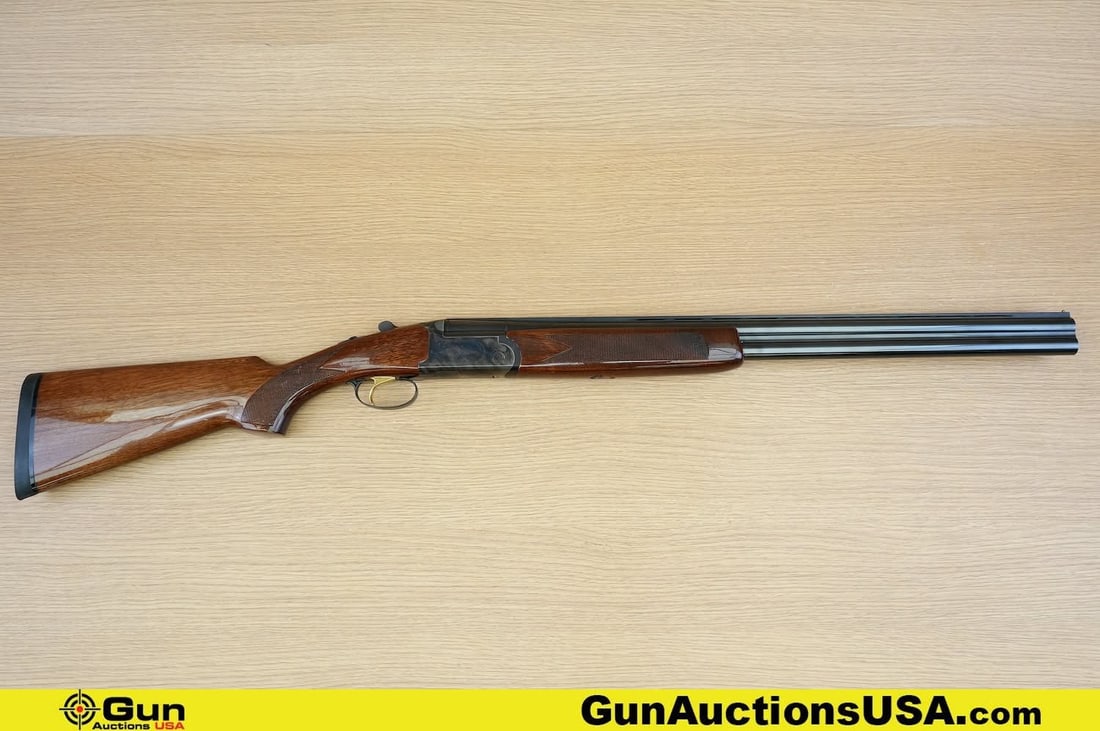 CHARLES DALY FIELD HUNTER 12 ga. Shotgun. Very Good. 26" Barrel. Shiny Bore, Tight Action Break: CHARLES DALY FIELD HUNTER 12 ga. Shotgun. Very Good. 26" Barrel. Shiny Bore, Tight Action Break Action Over-Under. Featuring a Durable Checkered Walnut Stock, Gold Plated Trigger, Case Hardened Engrav