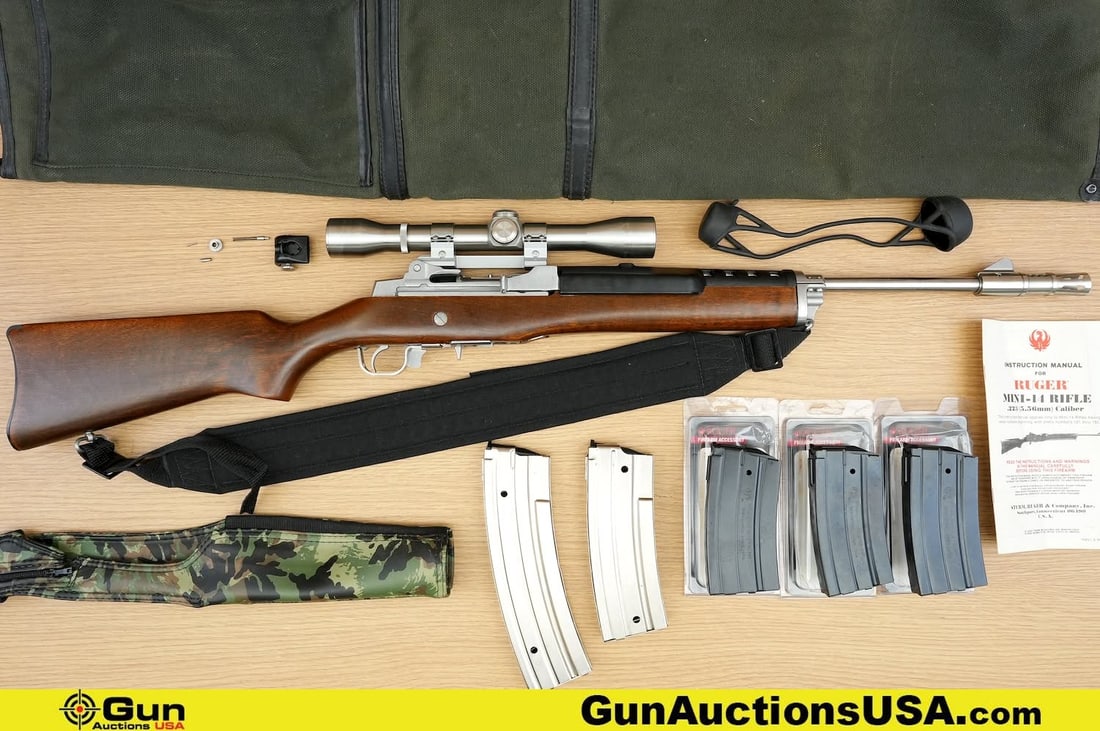 RUGER MINI-14 .223 cal. Rifle . Excellent. 18.5" Barrel. Shiny Bore, Tight Action Semi Auto . A: RUGER MINI-14 .223 cal. Rifle . Excellent. 18.5" Barrel. Shiny Bore, Tight Action Semi Auto . A Great Set Up! Featuring a Very Nice Full Length Walnut Stock, Trigger Guard Safety, Right Side Charging 
