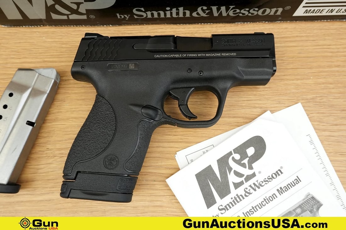 S&W M&P 9 SHIELD 9mm Pistol. Excellent. 2" Barrel. Shiny Bore, Tight Action Semi Auto . A Slim,: S&W M&P 9 SHIELD 9mm Pistol. Excellent. 2" Barrel. Shiny Bore, Tight Action Semi Auto . A Slim, Lightweight Profile Ideal for Concealed Carry, Textured grip for Enhanced Control, White-Dot sights, Rig