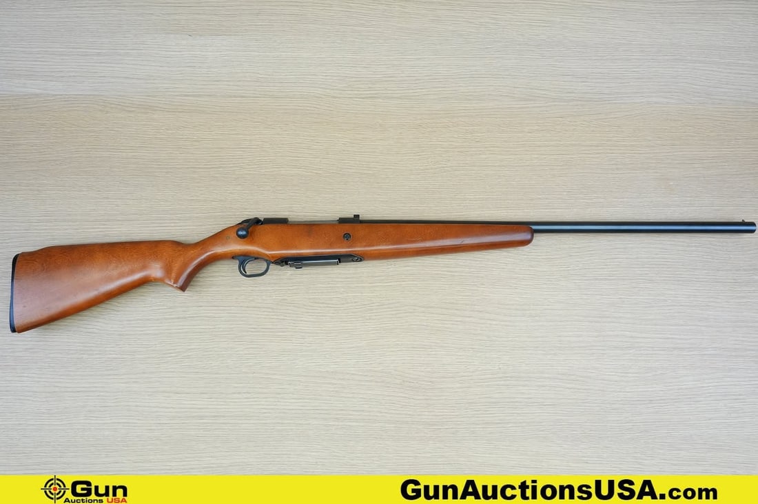 REVELATION R325BB 20 ga. Shotgun. Good Condition, Normal Handling Marks. 26" Barrel. Shiny Bore,: REVELATION R325BB 20 ga. Shotgun. Good Condition, Normal Handling Marks. 26" Barrel. Shiny Bore, Tight Action Bolt Action . Featuring a Full Length Wood Stock, Brass Bead Front Sight, Rear V- Notch Si