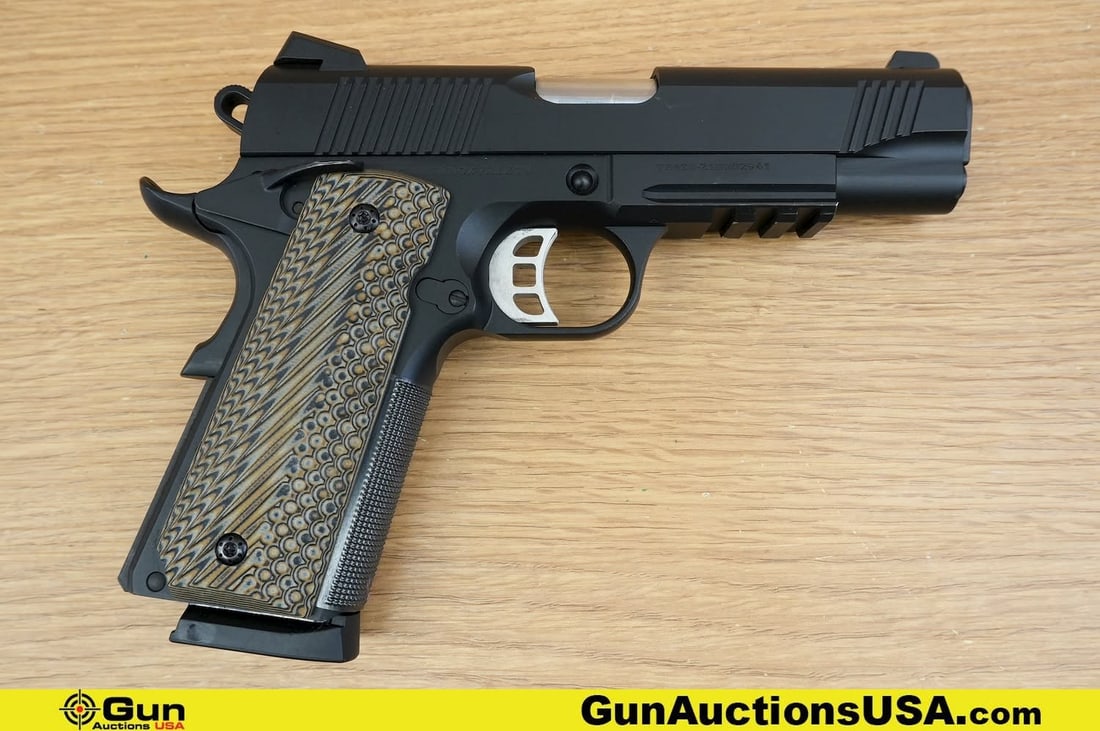 TISAS 1911 CARRY .45 ACP Pistol. Excellent. 3" Barrel. Shiny Bore, Tight Action Semi Auto . Features: TISAS 1911 CARRY .45 ACP Pistol. Excellent. 3" Barrel. Shiny Bore, Tight Action Semi Auto . Features a Forged Steel Frame, Novak-style Sights, Skeletonized Trigger, Checkered Grips, Extended beavertai