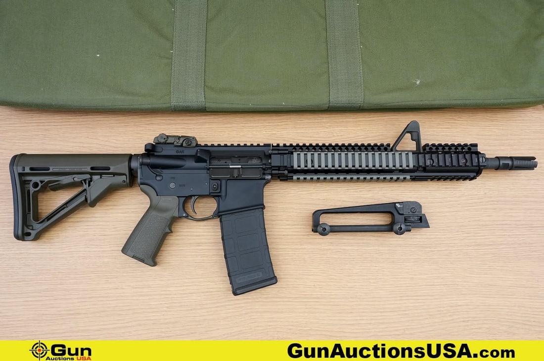 ARMALITE SPR MOD 1 5.56 MM Rifle. Excellent. 16" Barrel. Shiny Bore, Tight Action Semi Auto . A: ARMALITE SPR MOD 1 5.56 MM Rifle. Excellent. 16" Barrel. Shiny Bore, Tight Action Semi Auto . A Great Set Up Featuring a Magpul Pistol Grip and Adjustable Stock, Magpul Flip Up Rear Sight and Trigger 