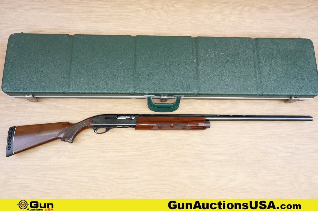 REMINGTON 1100 12 ga. Shotgun. Very Good. 28" Barrel. Shiny Bore, Tight Action Semi Auto . Features: REMINGTON 1100 12 ga. Shotgun. Very Good. 28" Barrel. Shiny Bore, Tight Action Semi Auto . Features a Sleek Walnut Stock, Engraved Receiver, Ventilated Rib Barrel, Reliable Gas-Operated Mechanism, Rub