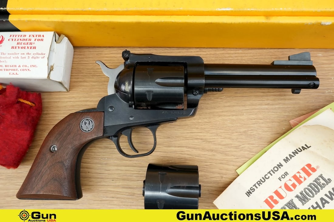 RUGER NEW MODEL BLACKHAWK .45 Revolver. Good Condition, Normal Handling Marks. 4.5" Barrel. Shiny: RUGER NEW MODEL BLACKHAWK .45 Revolver. Good Condition, Normal Handling Marks. 4.5" Barrel. Shiny Bore, Tight Action . Features an Adjustable Rear Sight, Large Blade Front Sight, Side Gate Loading wit