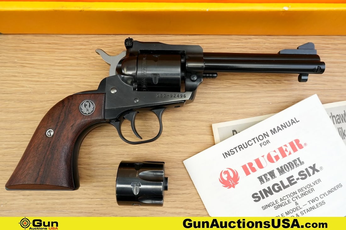 RUGER NEW MODEL SINGLE-SIX .22 Winchester Magnum Revolver. Excellent. 4.5" Barrel. Shiny Bore, Tight: RUGER NEW MODEL SINGLE-SIX .22 Winchester Magnum Revolver. Excellent. 4.5" Barrel. Shiny Bore, Tight Action . Features a Solid Steel Construction, Side Gate Loading Mechanism, Adjustable Rear Sight, S