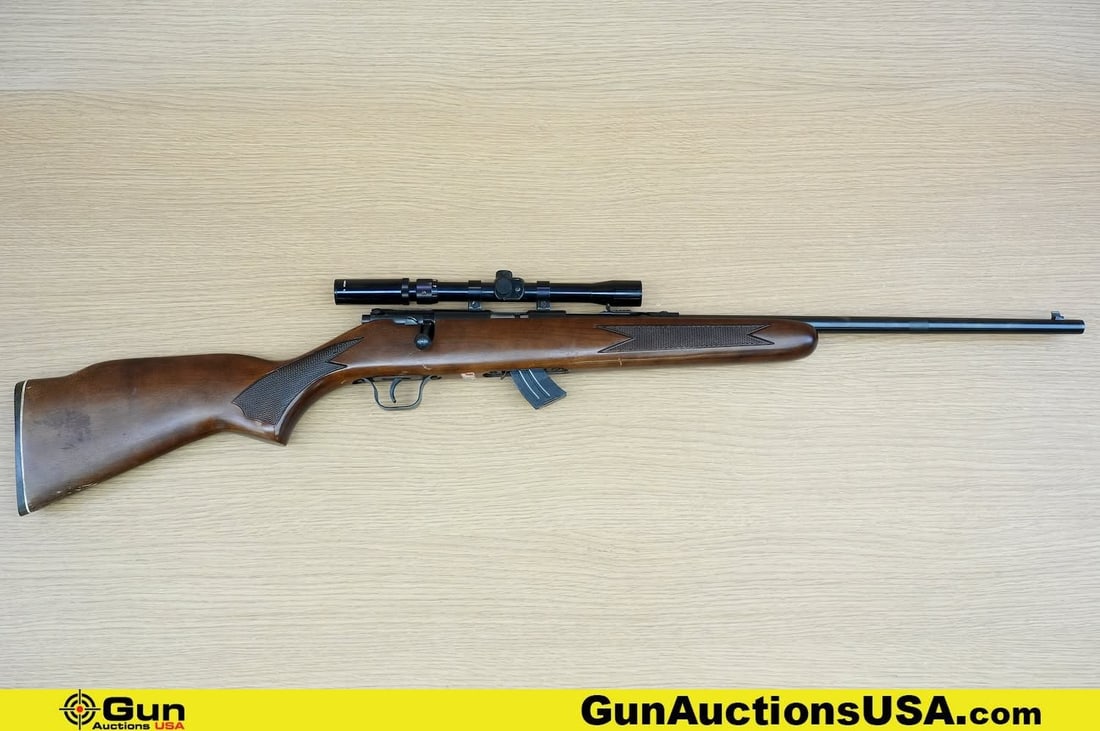 LAKEFIELD ARMS MARK II .22 LR Rifle . Good Condition, Normal Handling Marks. 21" Barrel. Shootable: LAKEFIELD ARMS MARK II .22 LR Rifle . Good Condition, Normal Handling Marks. 21" Barrel. Shootable Bore, Tight Action Bolt Action . Features a Blued Finish, Straight Grained Walnut Stock with Checkeri