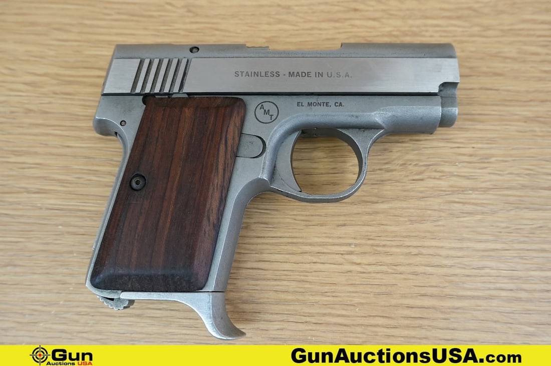 AMT Back up .380 9MM KURZ COLLECTOR'S Pistol. Good Condition, Normal Handling Marks. 3" Barrel.: AMT Back up .380 9MM KURZ COLLECTOR'S Pistol. Good Condition, Normal Handling Marks. 3" Barrel. Shiny Bore, Tight Action Semi Auto . Features Wood Grips, Stainless Steel Frame Slide and Barrel, Left S