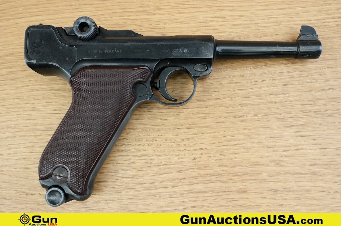 ERMA La 22 .22 LR Pistol. Good Condition, Normal Handling Marks. 4.5" Barrel. Shiny Bore, Tight: ERMA La 22 .22 LR Pistol. Good Condition, Normal Handling Marks. 4.5" Barrel. Shiny Bore, Tight Action Semi Auto . Features a Sleek German Design, Checkered Polymer Grips, Luger Type Toggle Action, Fi