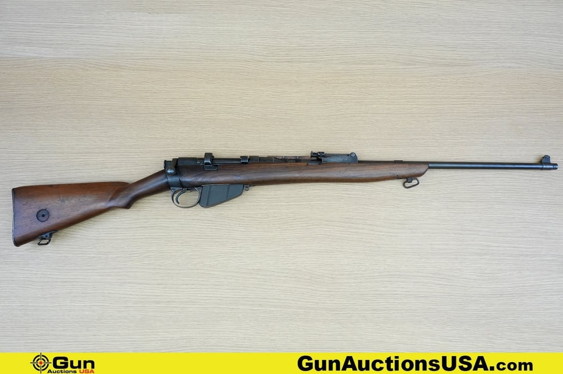 ENFIELD 1915 .303 COLLECTOR'S Rifle . Good Condition, Normal Handling Marks. 25'' Barrel. Shootable: ENFIELD 1915 .303 COLLECTOR'S Rifle . Good Condition, Normal Handling Marks. 25'' Barrel. Shootable Bore, Tight Action Bolt Action . Features an Adjustable Ladder Rear Sight, MATCHING NUMBERS on Recei