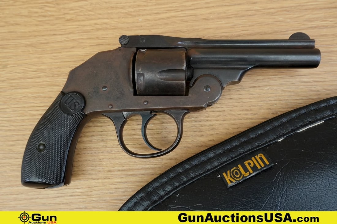 U.S. REVOLVER CO TOP BREAK .38 S&W CTGE Revolver. Good Condition, Normal Handling Marks. 3.25": U.S. REVOLVER CO TOP BREAK .38 S&W CTGE Revolver. Good Condition, Normal Handling Marks. 3.25" Barrel. Shiny Bore, Tight Action . Hammerless and Features a Original Bakelite Grips, Blued Finish, Fadin