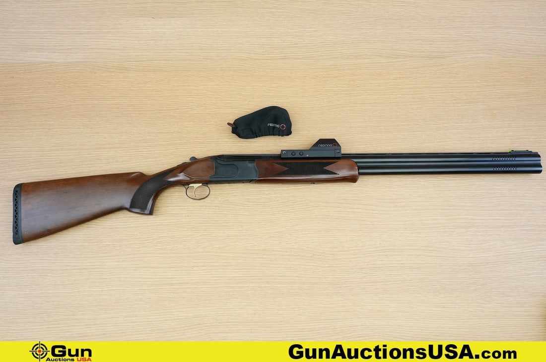 MOSSBERG ONYX RESERVE SPORTING 12 ga. Shotgun. Good Condition, Normal Handling Marks. 28" Barrel.: MOSSBERG ONYX RESERVE SPORTING 12 ga. Shotgun. Good Condition, Normal Handling Marks. 28" Barrel. Shootable Bores, Tight Action Over-Under/Break Action . Features a Single Selective Trigger, Mounted o