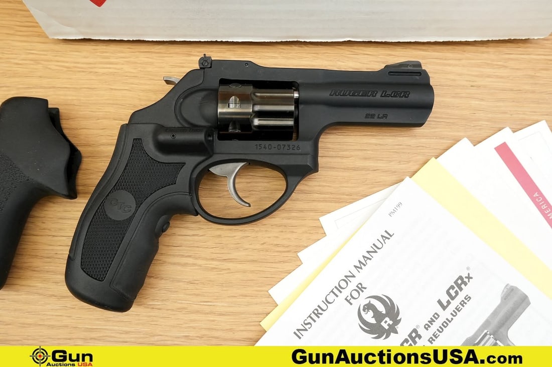 RUGER LCR .22 LR APPEARS UNFIRED Revolver. Excellent. 3" Barrel. . Features an Eight Shot Fluted: RUGER LCR .22 LR APPEARS UNFIRED Revolver. Excellent. 3" Barrel. . Features an Eight Shot Fluted Cylinder, Adjustable Rear Sight, Fixed Ramp Front Sight, Stainless Steel Barrel, Light Weight Textured 