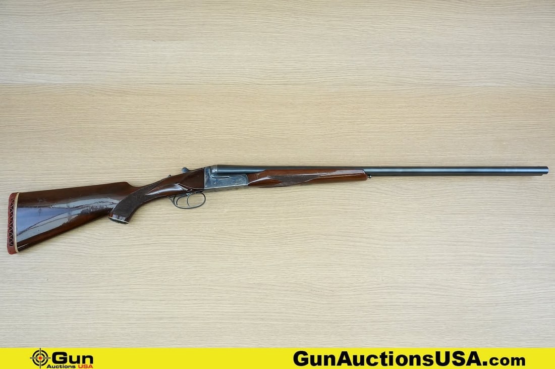 GUBUSABEL 522 20 GA. MAGNUM Shotgun. Good Condition, Normal Handling Marks. 28" Barrel. Shiny Bores,: GUBUSABEL 522 20 GA. MAGNUM Shotgun. Good Condition, Normal Handling Marks. 28" Barrel. Shiny Bores, Tight Action . Features a Laminate Checkered Wood Stock and Front Grip, Blued Barrels, Engraved Rec
