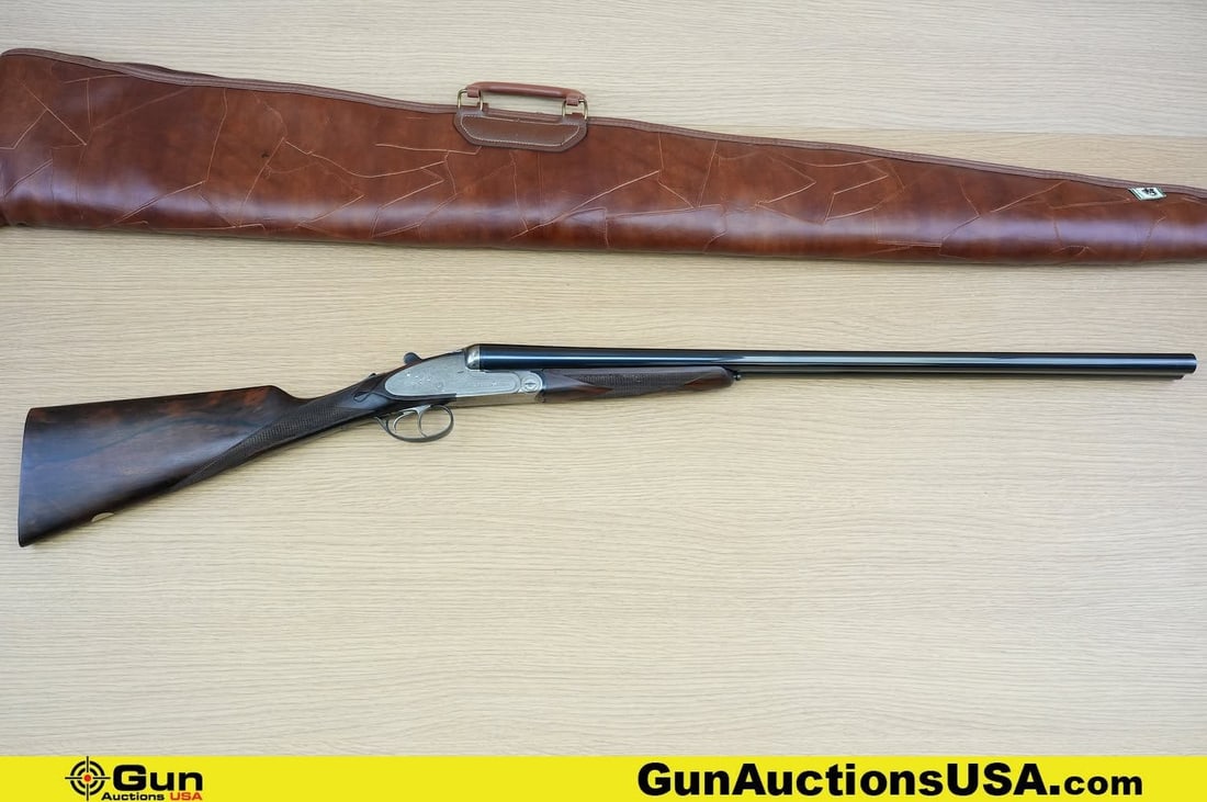 SARRIUGARTE/AMERICAN ARMS SLE DERBY 12 ga. Magnum SIDE LOCK Shotgun. Excellent. 28" Barrel. SXS: SARRIUGARTE/AMERICAN ARMS SLE DERBY 12 ga. Magnum SIDE LOCK Shotgun. Excellent. 28" Barrel. SXS BREAK OPEN. WOW! What a BEAUTY! Features a Dual Trigger, Automatic Ejectors, Splinter Forend, Straight G