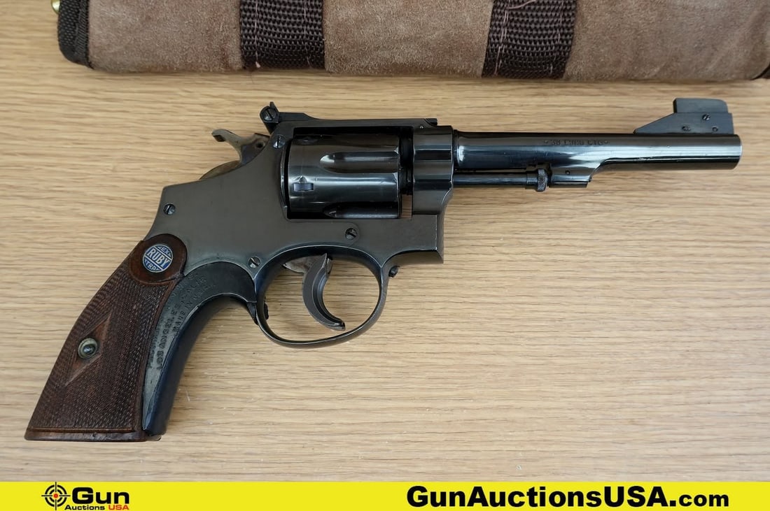 RUBY extra .38 SPL CTG/Long Revolver. Very Good. 4 7/8" Barrel. Shiny Bore, Tight Action Features a: RUBY extra .38 SPL CTG/Long Revolver. Very Good. 4 7/8" Barrel. Shiny Bore, Tight Action Features a Pinned "Micro" Target Front Sight, Target Adjustable Rear Sight, Blued Finish, S&W Clone. Fluted Six
