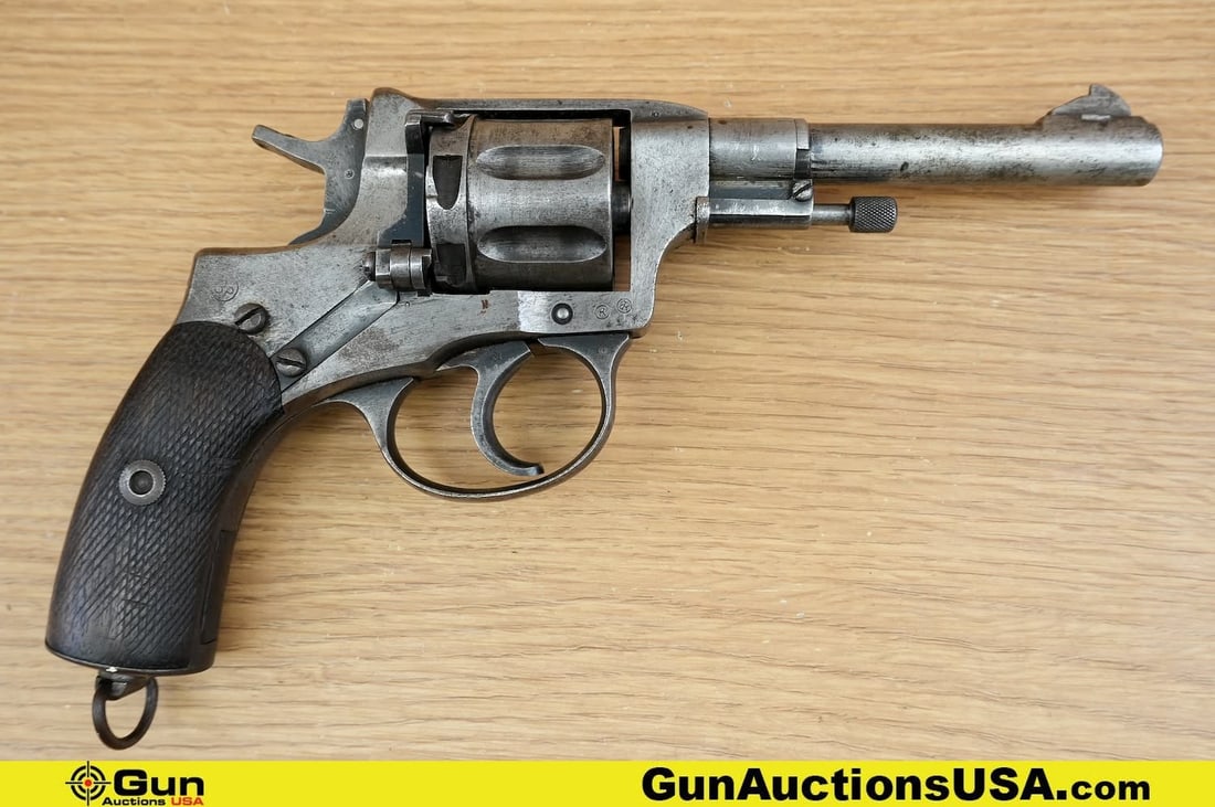 TULA NAGANT 1935 7.62X38R COLLECTOR'S Revolver. Good Condition, Normal Handling Marks. 4.5" Barrel.: TULA NAGANT 1935 7.62X38R COLLECTOR'S Revolver. Good Condition, Normal Handling Marks. 4.5" Barrel. Shootable Bore Features a Drift Adjustable Front Sight, Trench Style Rear Sight, DA/SA, Fluted Seven