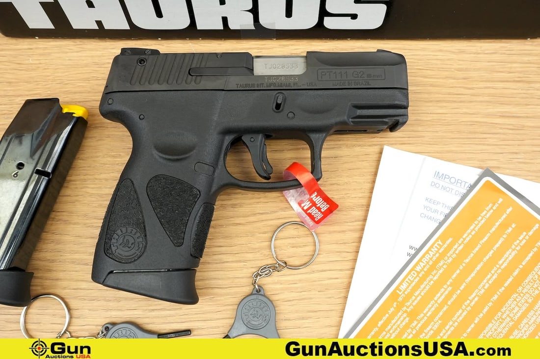 Taurus PT111 G2 MILLENNIUM 9mm Pistol. Excellent. 3" Barrel. Shiny Bore, Tight Action Semi Auto A: Taurus PT111 G2 MILLENNIUM 9mm Pistol. Excellent. 3" Barrel. Shiny Bore, Tight Action Semi Auto A sleek, reliable 9mm sidearm blending modern design with dependable performance, with a Fixed White dot