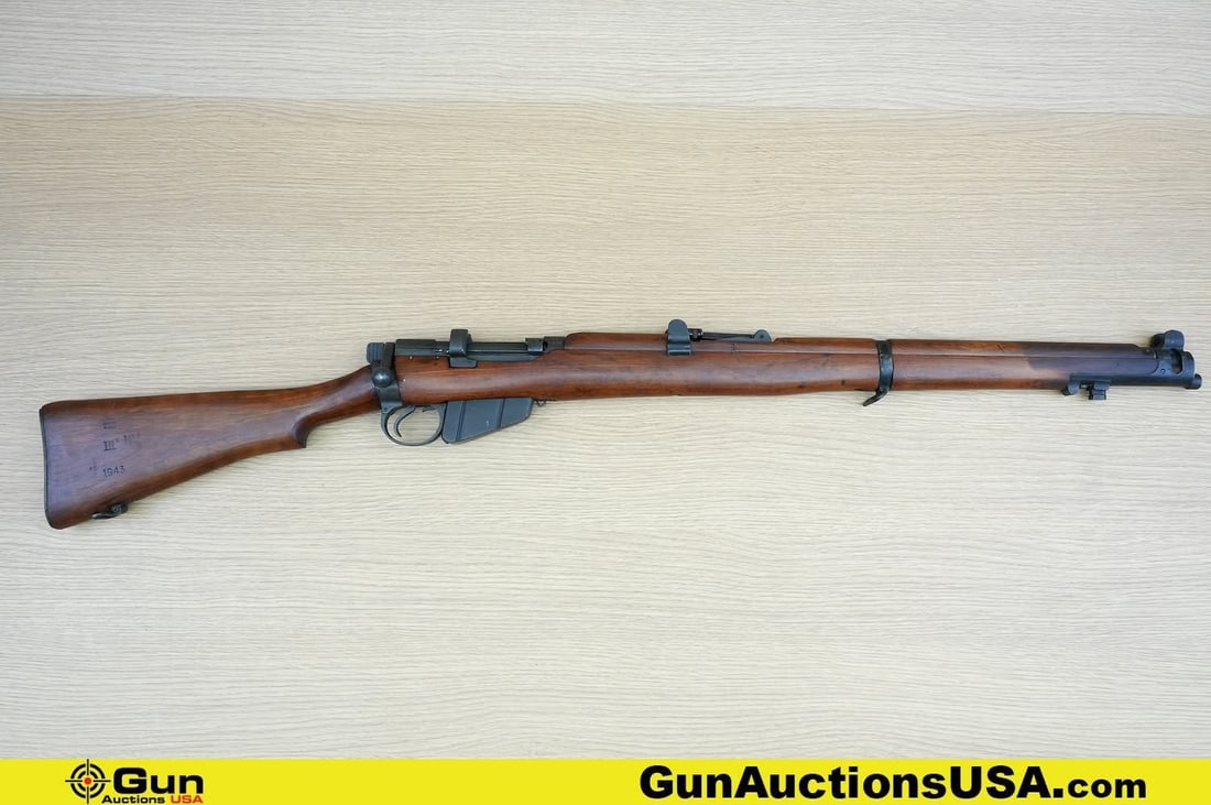 ENFIELD/LITHGOW SMLE III .303 COLLECTOR'S Rifle. Very Good. 25" Barrel. Shiny Bore, Tight Action: ENFIELD/LITHGOW SMLE III .303 COLLECTOR'S Rifle. Very Good. 25" Barrel. Shiny Bore, Tight Action Bolt Action 1943 Production. STAMPINGS Behind Trigger Guard, III, STAR, HV NO4 LITHGOW SMLE STAMPED on 