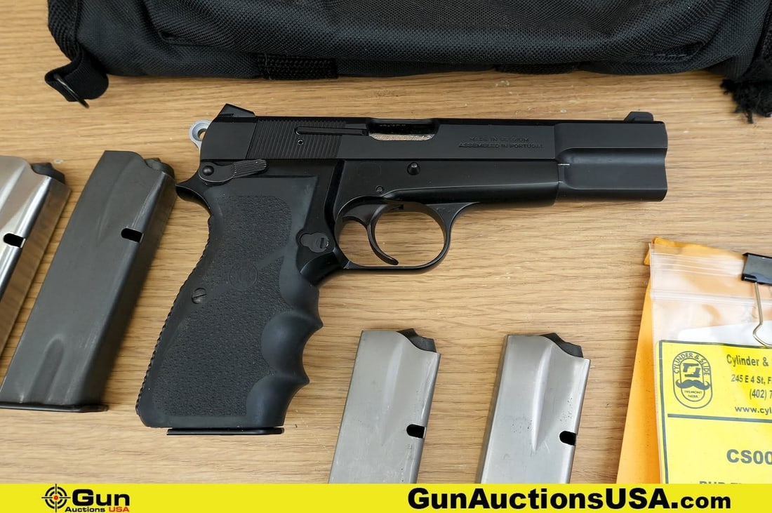 Browning HI-POWER 9mm Pistol. Excellent. 4.7" Barrel. Shiny Bore, Tight Action Semi Auto . A: Browning HI-POWER 9mm Pistol. Excellent. 4.7" Barrel. Shiny Bore, Tight Action Semi Auto . A Wonderful Browning, Featuring Rubber Hogue Grips, Left Side Extended Mag Release, and Left Side Pachmayr Sl