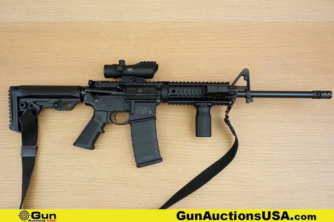 S&W M&P-15 5.56 NATO THREADED BARREL Rifle . Very Good. 16" Barrel. Shiny Bore, Tight Action Semi: S&W M&P-15 5.56 NATO THREADED BARREL Rifle . Very Good. 16" Barrel. Shiny Bore, Tight Action Semi Auto . Features a THERADED BARREL with A2 Flashider, A2 Pistol Grip, Adjustable Rear Stock, lightweigh