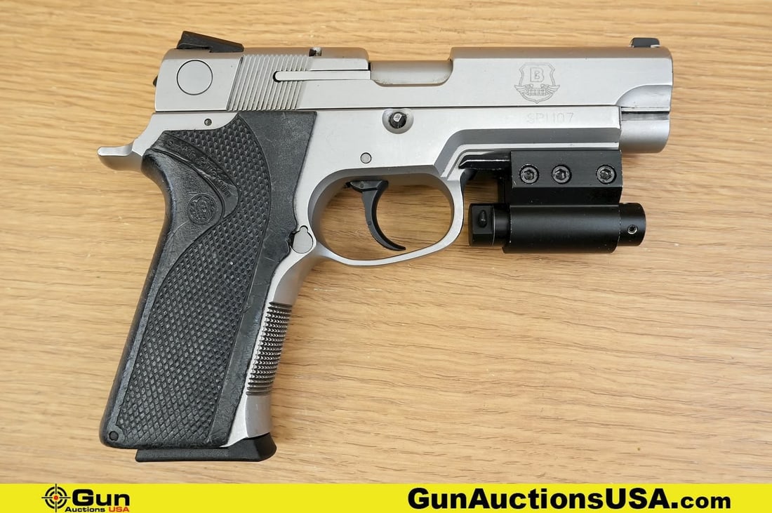S&W 4046TSW .40 S&W Pistol. Good Condition, Normal Handling Marks. 4" Barrel. Shiny Bore, Tight: S&W 4046TSW .40 S&W Pistol. Good Condition, Normal Handling Marks. 4" Barrel. Shiny Bore, Tight Action Semi Auto . Features a Heavy Stainless Steel Frame and Slide, Red Dot Laser Mounted Bottom of Acc