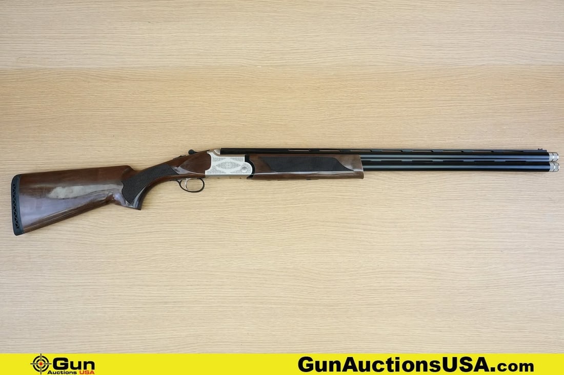 KRAL Tristar UPLAND HTR 12 ga. Shotgun. Very Good. 28" Barrel. Shiny Bore, Tight Action Over Under: KRAL Tristar UPLAND HTR 12 ga. Shotgun. Very Good. 28" Barrel. Shiny Bore, Tight Action Over Under Single Shot. Features a Laminate Checkered Wood Stock and Foregrip, Engraved Steel Receiver, Tang Mou