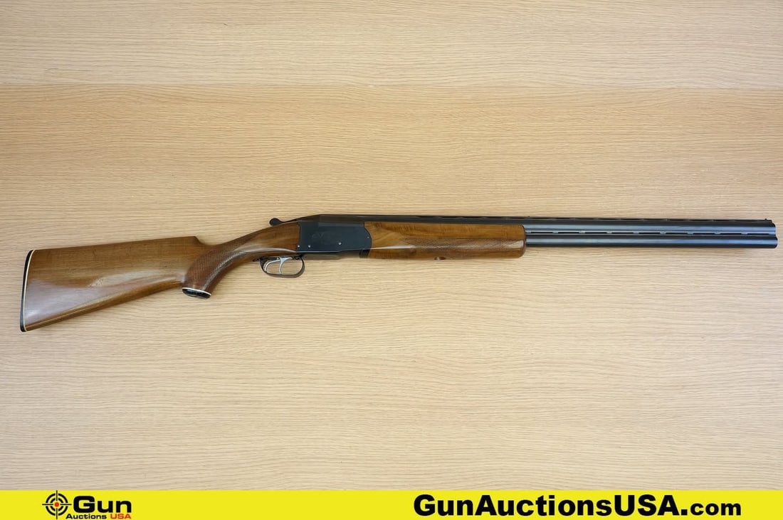 ERA NONE MARKED 12 ga. BREAK ACTION Shotgun. Good Condition, Normal Handling Marks. 26" Barrel.: ERA NONE MARKED 12 ga. BREAK ACTION Shotgun. Good Condition, Normal Handling Marks. 26" Barrel. Shootable Bore Single Shot-Over Under. Features a Checked hardwood Stock and Foregrip, Tang Mounted Safe