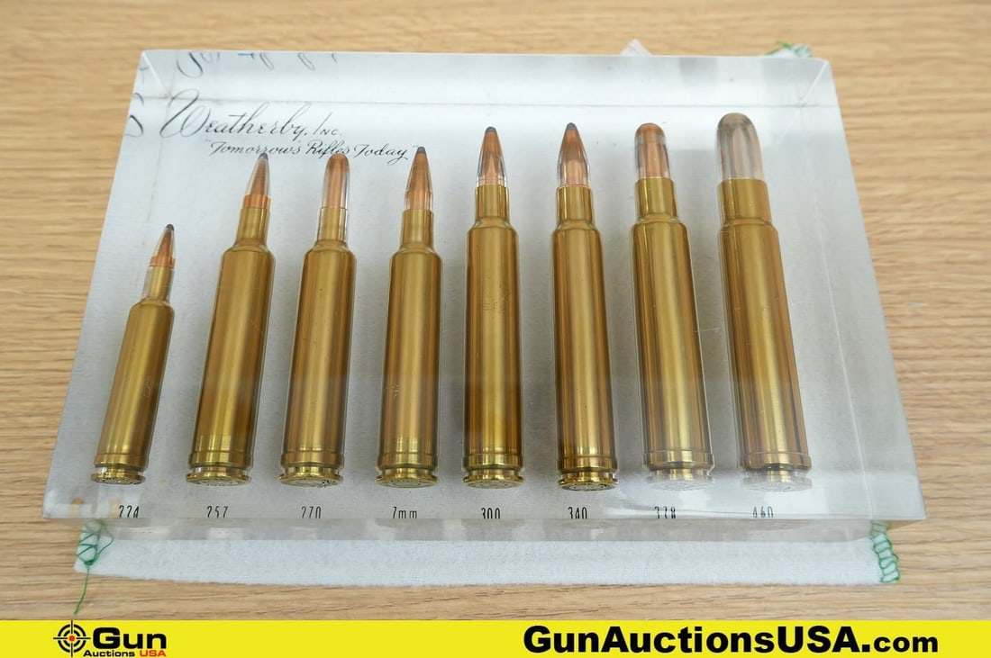 Weatherby Display Case. Very Good. . One Lucite Cartridge Display Case. Featuring Eight Cartridges (1 of 9)