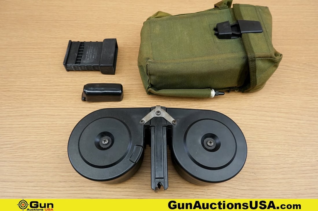 CMAG 5.56 Mag, Pouch. Very Good. . One 100 Rd AR 15 BETA 5.56 Mag with Speed Loader and Pouch. . (1 of 9)