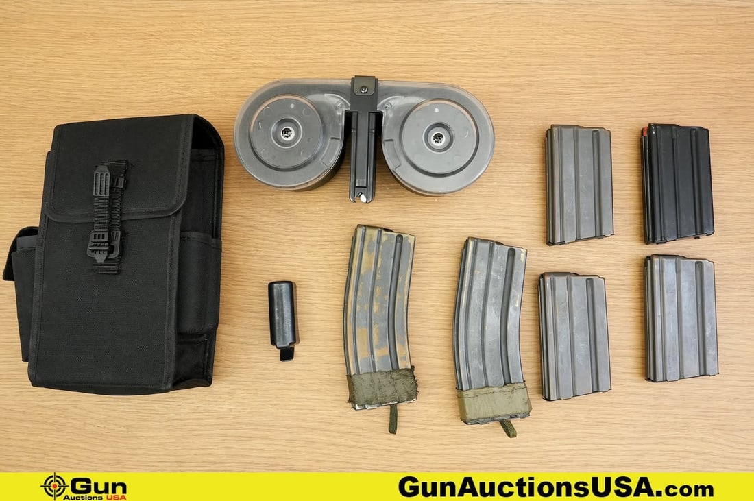 Surplus 5.56 Mags, Etc. . Good Condition. . One AR15 5.56 Nato,100 Rd Drum Mag, Includes Pouch. One: Surplus 5.56 Mags, Etc. . Good Condition. . One AR15 5.56 Nato,100 Rd Drum Mag, Includes Pouch. One Speed Loader, Four 10 Rd 5.56 AR Mags and Two 20 Rd 5.56 AR Mags. . (83201) (GSCO80)