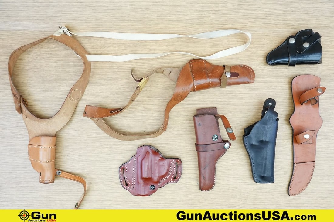 DeSantis, Bucheimers, Hunter, Etc. Accessories. Fair Condition. . One Bucheimer 504 Revolver: DeSantis, Bucheimers, Hunter, Etc. Accessories. Fair Condition. . One Bucheimer 504 Revolver Shoulder Holster, One Leather Knife Sheath, One Metropolitan Uniform Co. NS/2 Revolver Shoulder Holster, On