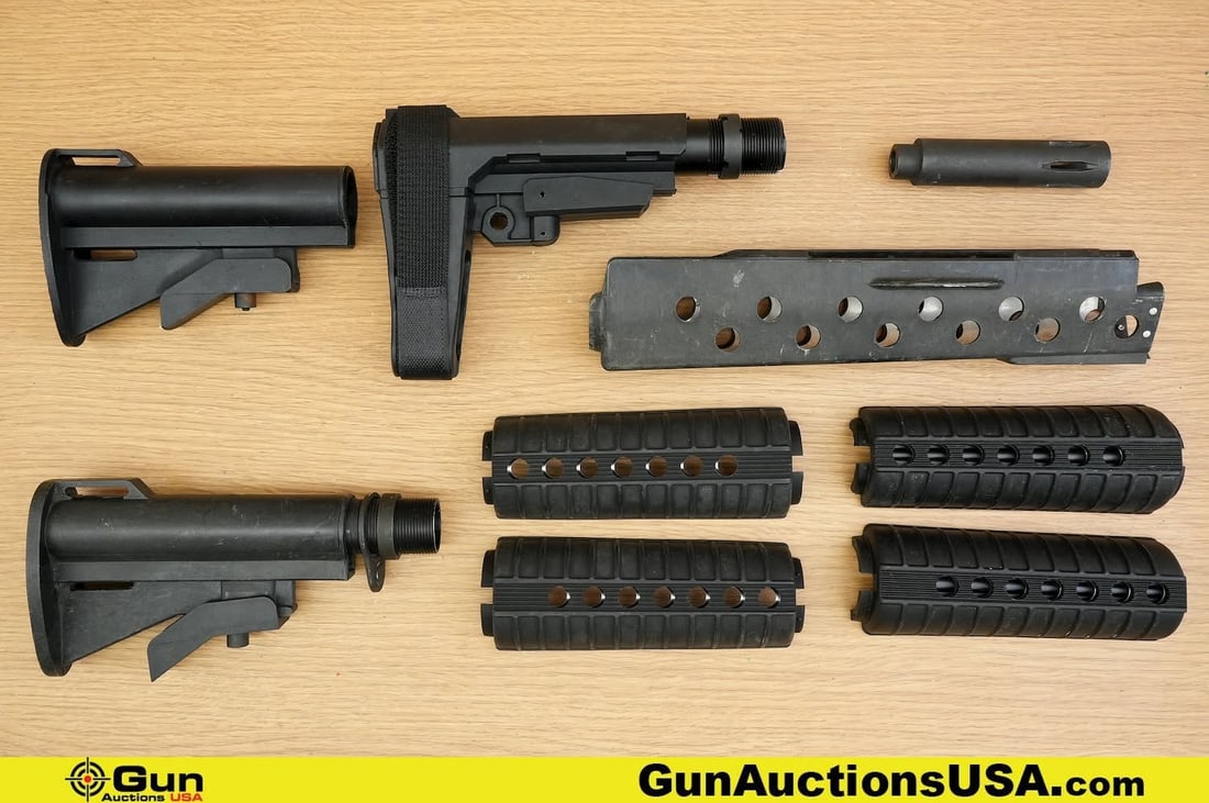 M203, M16, Etc. Accessories . Good Condition, Normal Handling Marks. . One M203 Handguard, Two M16: M203, M16, Etc. Accessories . Good Condition, Normal Handling Marks. . One M203 Handguard, Two M16 Carbine Length Handguards, One M16 Flashider, and Three AR Style Telescoping Butt Stocks. . (83230) (