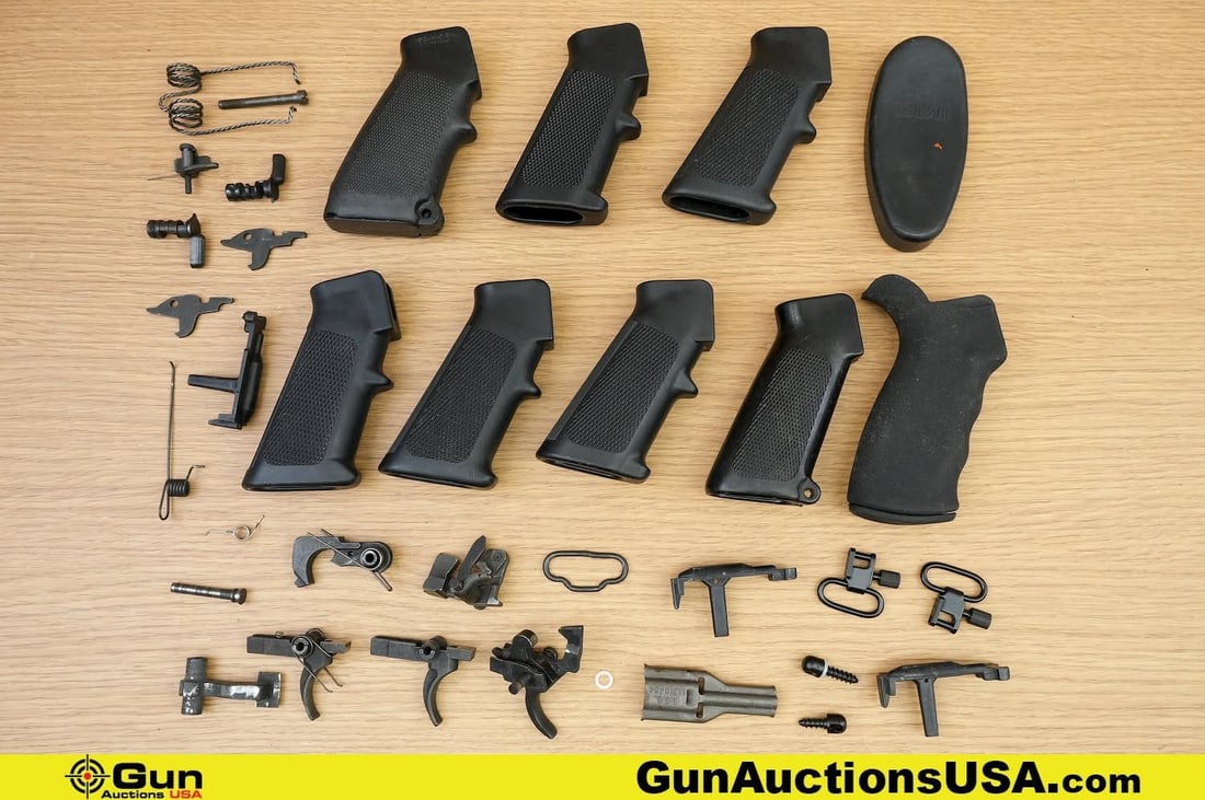 Surplus Parts, Accessories. Good Condition, Normal Handling Marks. . Eight AZ AR Grips, Military: Surplus Parts, Accessories. Good Condition, Normal Handling Marks. . Eight AZ AR Grips, Military Surplus AR Triggers, Military Surplus AK Triggers, Sling Swivels, and Misc. AR AK Parts. . (83251) (GSC