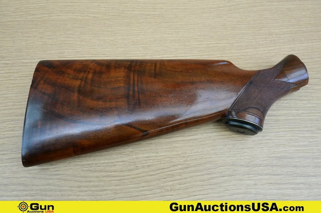 Winchester 12 Stock . Good Condition, Normal Handling Marks. . Appears to be a Winchester 12: Winchester 12 Stock . Good Condition, Normal Handling Marks. . Appears to be a Winchester 12 Refurbished Butt Stock, Replaced and Married at Neck Grade Four Fancy Wood, with Hand Checkered Grip, No Bu