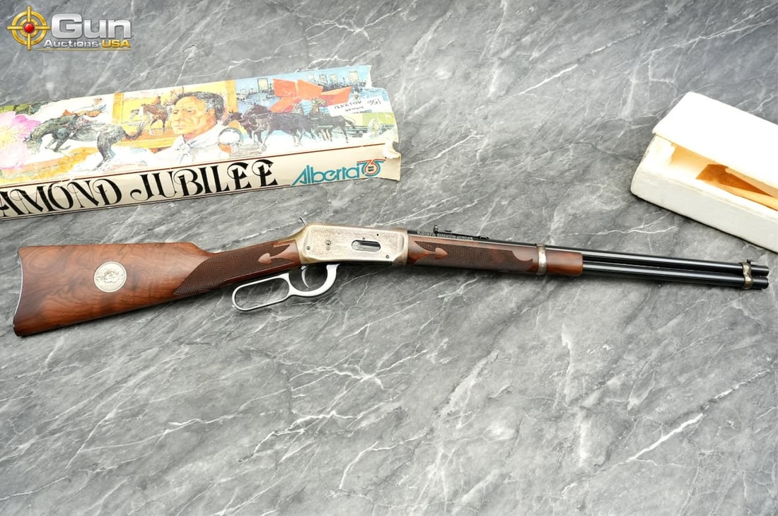 Winchester 94 ALBERTA DIAMOND JUBILEE 38-55 WIN RIFLE, sn:ADJ2431 Excellent Condition Winchester: Winchester 94 ALBERTA DIAMOND JUBILEE 38-55 WIN RIFLE, sn:ADJ2431 Excellent Condition Winchester Model 94 Alberta Diamond Jubilee .38-55 Win Commemorative Lever-Action Rifle: A beautifully preserved c